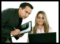 A man and woman business team at their company office